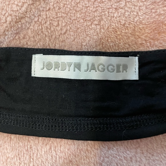 Super cute black halter tank with strappy back. Perfect for going out. - Picture 3 of 4